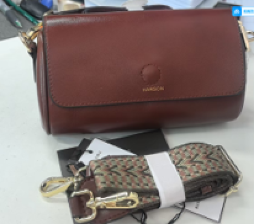 chic brown leather cylinder crossbody bag
