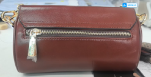 chic brown leather cylinder crossbody bag