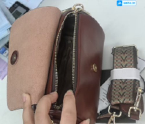 chic brown leather cylinder crossbody bag