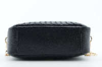 sleek black quilted camera bag