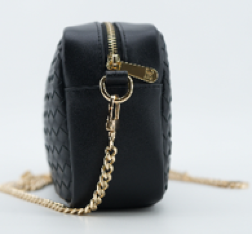 sleek black quilted camera bag